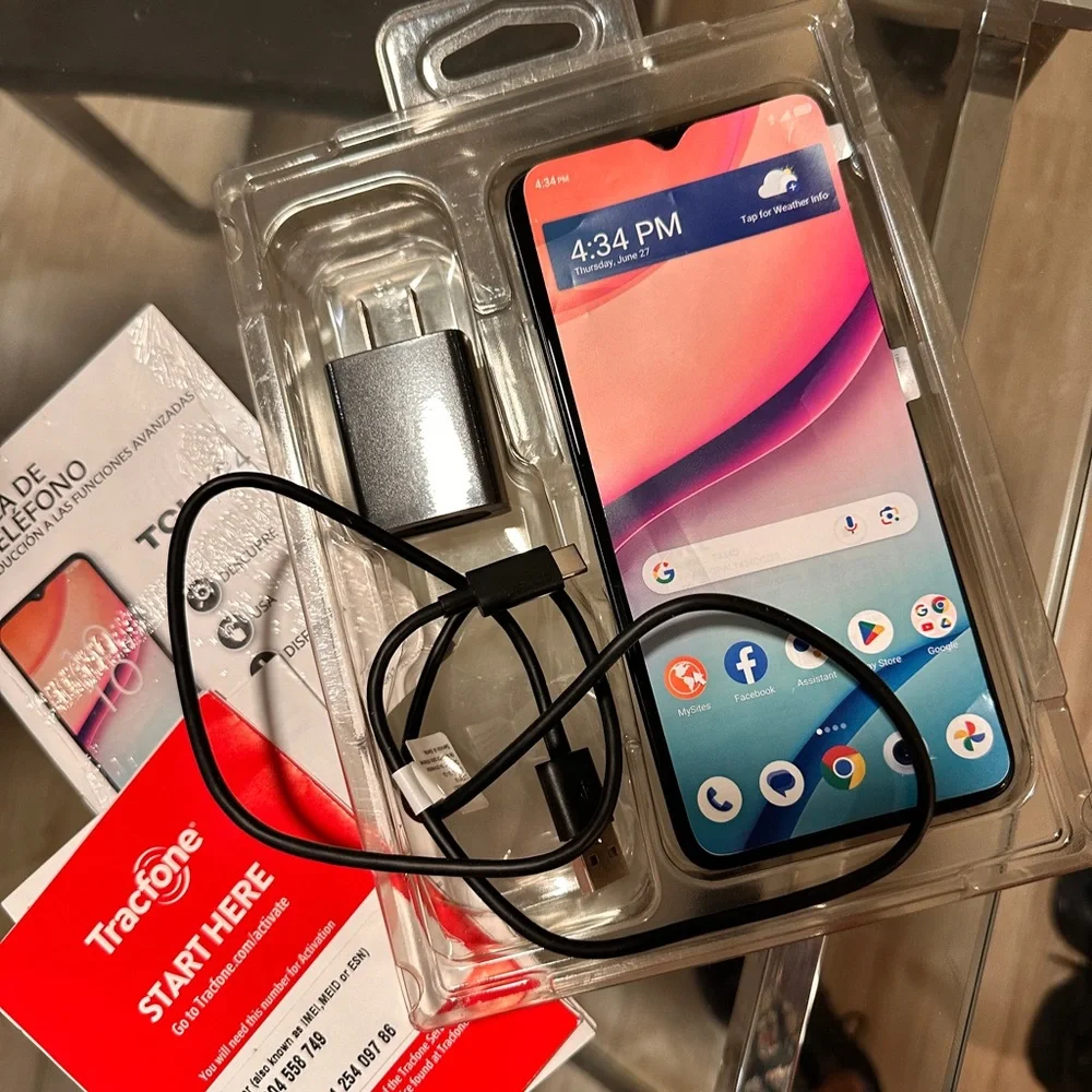TCL Smartphone with Vibrant Display and Black Charger